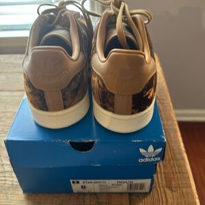 Never worn. New in the original box. Unique velour purple insert.